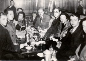 Photo of the 1st jury of the Prix des Deux MAgots in 1933, around a table in the café